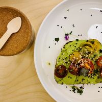 Omg the best avocado & tomato toast with basil olive oil!! at Yum Baaar in Segovia