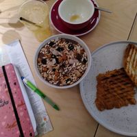 Breakfast bowl, finished café y zumo and croissant 🥐 from toaster..plus extra espresso costed 16 euro. at Yum Baaar in Segovia