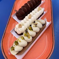 Pistachio/cherry, banana/caramel and chocolate/plum vegan eclairs #Veganuary at Eklerownia in Gdansk