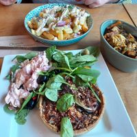 Mediterranean tart, salad & Bubble & Squeak. Behind is the Tropical Fries. at The Bay Vegan Deli Coffee House in Sandown