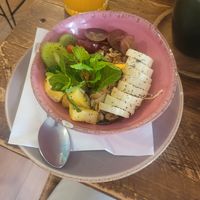 Soy yogurt bowl with fruit and granola at Break Sé in Lisbon