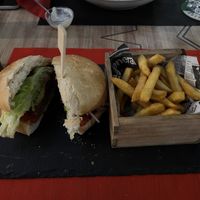Vegan plant based burger with avocado and fries  at Los Andes in Santa Pola