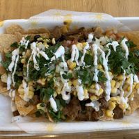 Nachos topped with vegan carne asada at Plantos in Riverside