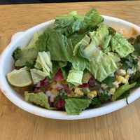 Bowl topped with vegan chicken  at Plantos in Riverside