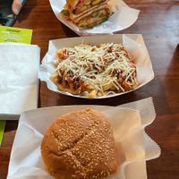 Satifaction Burger (top), loaded fries, and hot stuff burger  at Next Stop Vegan - Washington Heights in New York City