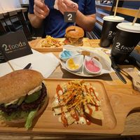 Tried both burgers which come with nachos   at 2foods - Yaechika in Tokyo