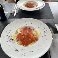 Raviolonis de calabaza y seitán con salsa de tomate  at Ordesa 88 in Ainsa