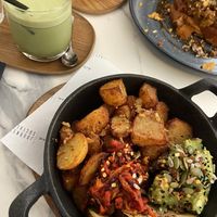 oat milk iced matcha and vegan hash breakfast  at Journey Social Kitchen in Lancaster