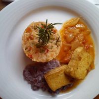 Rosemary rice, smoked tofu, confited tomato and sauce à la "hunter that didn't hunt" at Cor de Tangerina in Guimaraes
