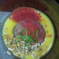 Carob mousse with pineapple, coconut cream and nuts
 at Cor de Tangerina in Guimaraes