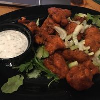 BUFFALO CAULIFLOWER WINGS
Hand-breaded Cauliflower Florets Tossed in Buffalo Sauce Served with Vegan Garlic Aioli
$11 / $16 V  at Julia's Vegetarian Restaurant in Pacific Grove