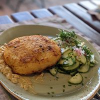 Erdäpfelpuffer mit Zwiebelsenf und Gurkensalat at Lindenhof in Millstatt