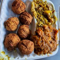 Black-eye pea fritters, curried cabbage, and yams at The Land of Kush in Baltimore