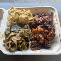 mac n cheese, collards, ribs  at The Land of Kush in Baltimore