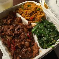 BBQ rib platter! Ribs, carrot salad, and sesame spinach.  at The Land of Kush in Baltimore