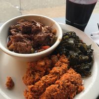 BBQ ribs, collard greens, carrot tuna salad and sorrel drink at The Land of Kush in Baltimore