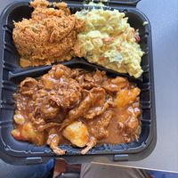 Delish Home Cooking ❤️  BBQ Ribs, potato salad and carrot tuna salad.  at The Land of Kush in Baltimore