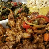 Bbq ribs!! W/ collards and mac n cheez at The Land of Kush in Baltimore