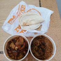 Mesa'ah (left), Tomato Foul (right) with the traditional bread (on top) at Kazaz Restaurant in Cairo