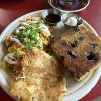 Potato leek vegan omelette, blueberry cornbread (OMG YUM) and potato hash cake 👌🏼   at Bouldin Creek Cafe in Austin