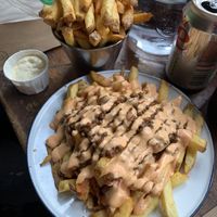 Vegan brisket loaded chips & a normal side of fries  at Patty & Bun in Brighton