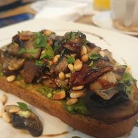 Tostada de champiñones y pesto at Nudie Foodie in Athens