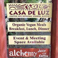 Sign out front   at Casa de Luz in Austin