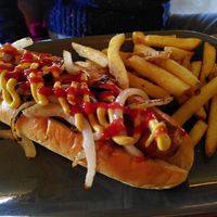 Hotdog and chips (March 2024) at Radcliffes Cafe Bar in Morpeth