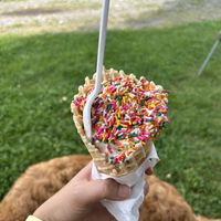 Mad monkey, rainbow sprinkles, waffle cone  at Ferris Acres Creamery in Newtown