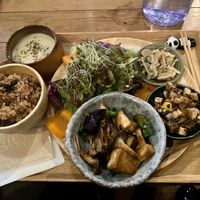 Sweet potato soup, balsamic mixed greens salad, lotus root dish, tofu/bamboo dish, red rice, and fried tofu/mushroom main dish at Vege To Coffee in Tokyo