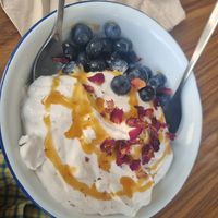 Weekly treat (blueberries with rose cream and petals). Yummmm at Venn Canteen in Porto