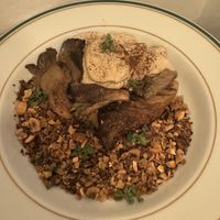 grilled oyster mushrooms • hazelnut and oat granola • porcini mushroom infused cream  at Venn Canteen in Porto