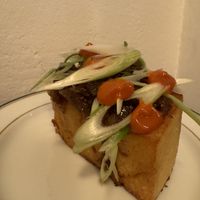 fried polenta, onion compote, gochujang  and coriander  at Venn Canteen in Porto