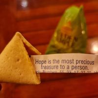 Fortune cookie at the end of the meal. at Umbrella Asian Tapas in Galway