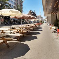 Outdoor seating at Klara Food Court in Basel