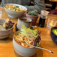 buddha bowl, spring rolls, coconut salad and green curry at Udum in Cologne
