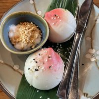 Dessert: „hefeklöße“ with coconut-peanut sauce  at Udum in Cologne