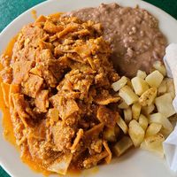 Migas plate is massive!!!!! at Mr. Natural - East Cesar in Austin