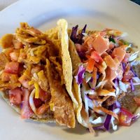 Tofu migas and fish tacos at Mr. Natural - East Cesar in Austin