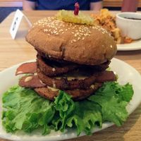 Bacon cheeseburger with onion rings at Mr. Natural - East Cesar in Austin