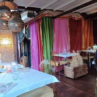 Outdoors seating area at Le Taj in Menton