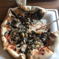 Pizza al fungi with mozzarella swapped for vegan cheese, and vegan garlic mayo on the side.   at Grain in Haverfordwest