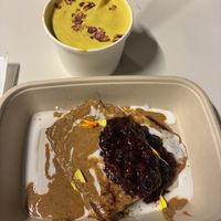 Banana bred and tumeric latte   at Thalatheen  in Doha