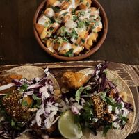Vegan tacos de coliflor capeado & papitas fritas  at La Taquería in Belfast