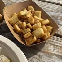 Lemon oregano potatoes   at Theano Vegan Greek & Mediterranean in Austin