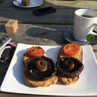 Mushroom, tomatoes on sourdough at Flint Barn Cafe in Midhurst