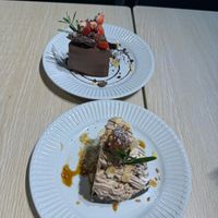 Chocolate cake (top) and chestnut cake (bottom) with a bite already taken out of them😅 at Root Vegan - 本原純素 in Hong Kong Island