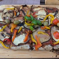 Black vegan pizza at Caffe Galeria in Piran
