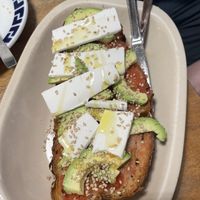 Tomato and avocado bread with vegan feta  at Café Bar El Muelle in Santiago De Compostela