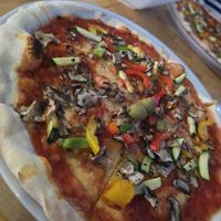 Stone baked Vegan Pizza minus vegan cheese at Pizzeria Desetka in Cavtat